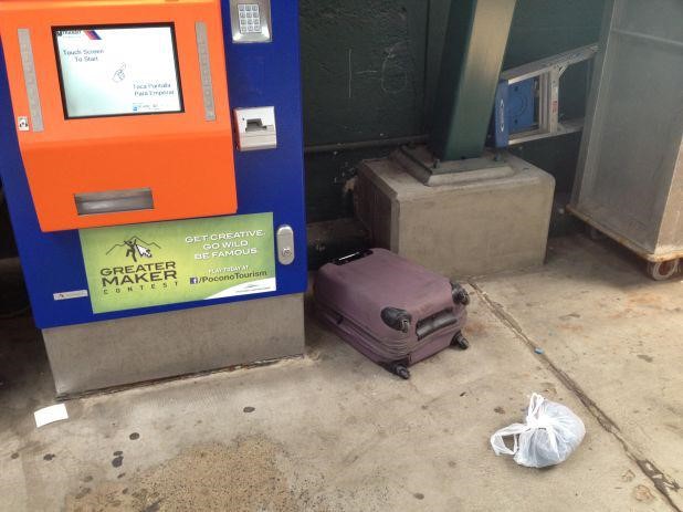 A picture containing sitting, suitcase, luggage, small

Description automatically generated